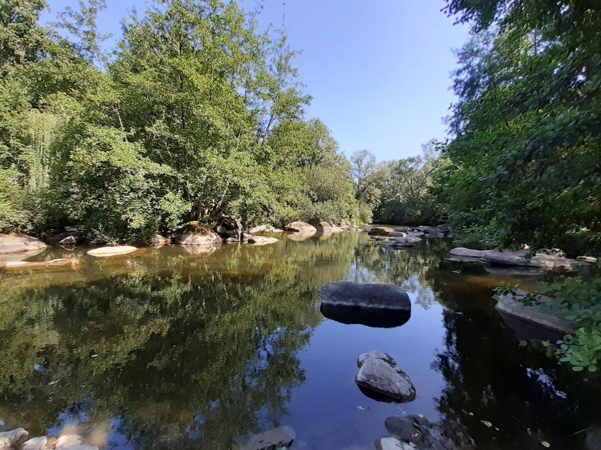 Village De Gites Du Moulin Neuf Getigne Bagian luar foto