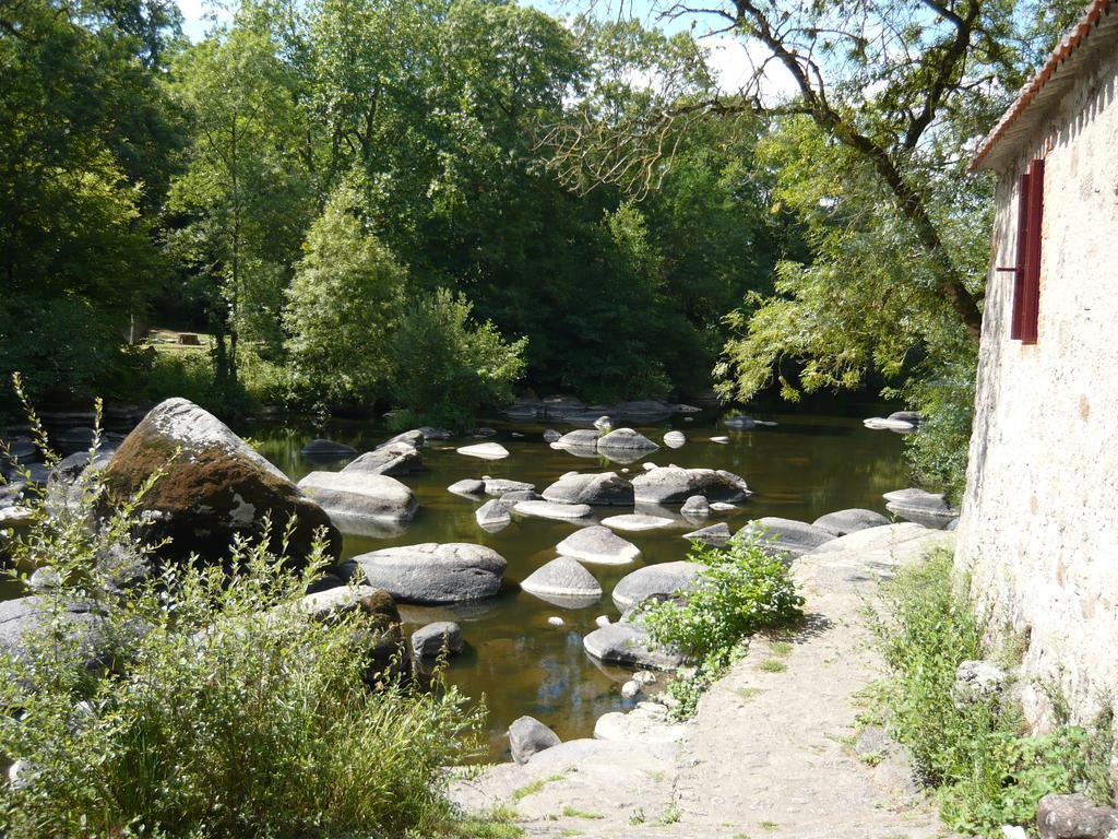 Village De Gites Du Moulin Neuf Getigne Bagian luar foto